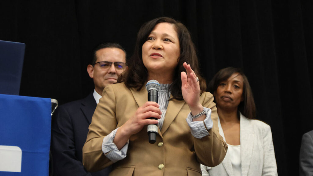 Dr. Gina Acosta Potter speaking at an event