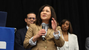 Dr. Gina Acosta Potter speaking at an event